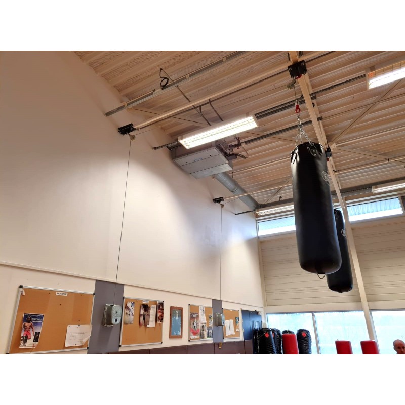 Manual winch for punching bag